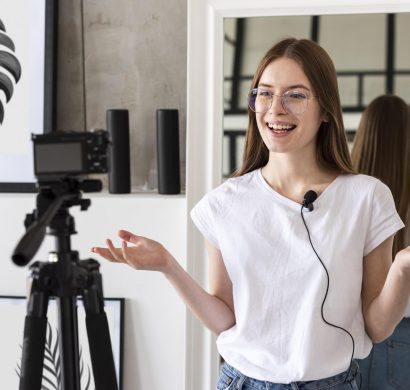 young-blogger-recording-with-professional-camera-mic